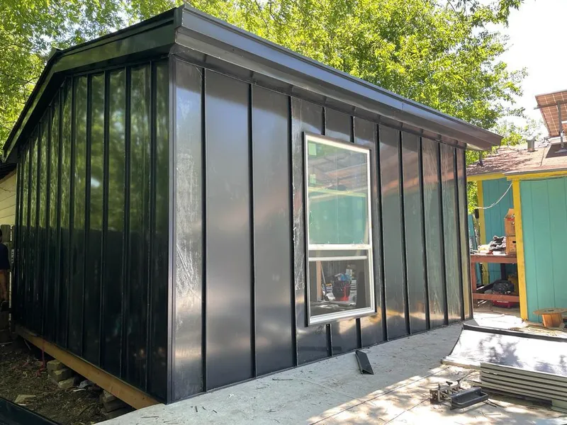 Black standing seam metal wall panels for Roof Inspection in Matteson